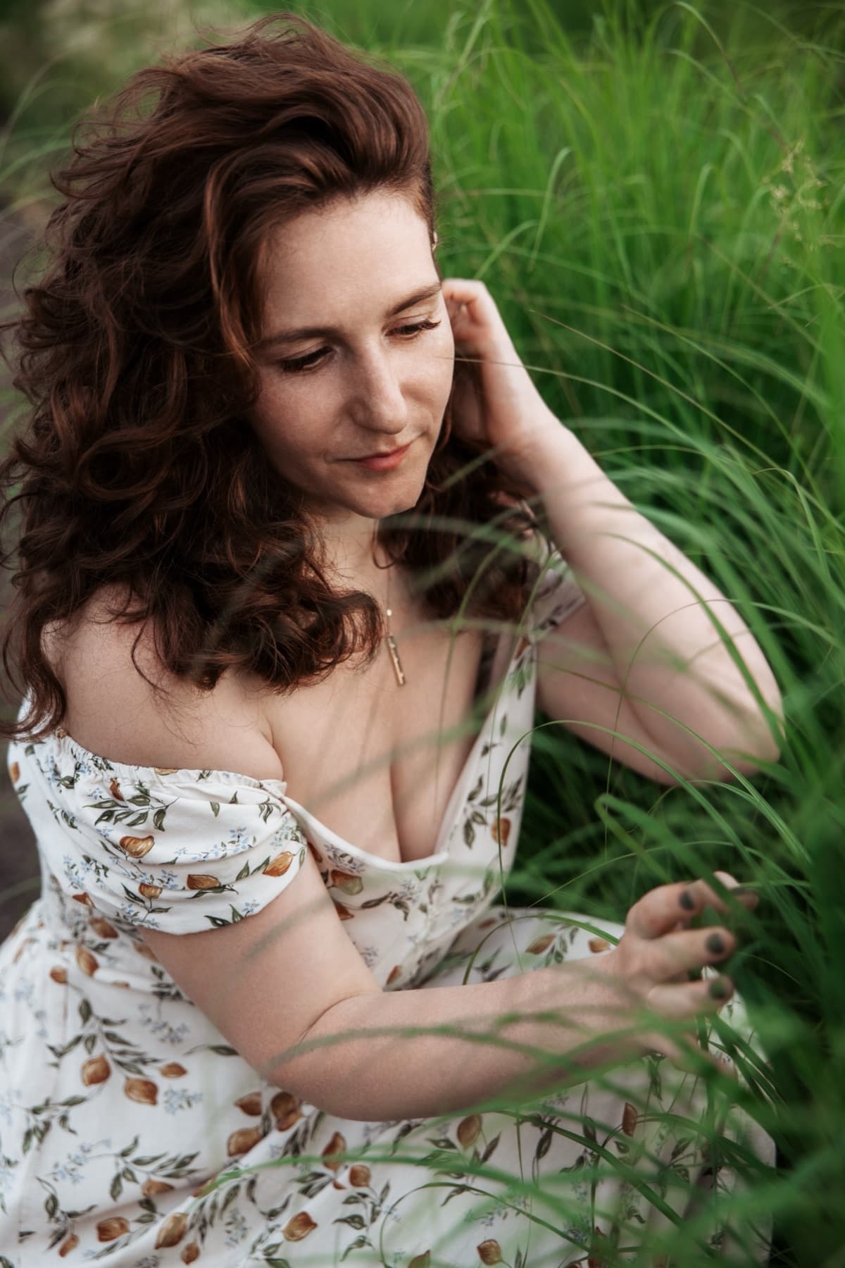 Anna Khovan among tall grass